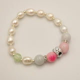 White pearl and jade bracelet with owl charm