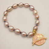 Pink pearl bracelet and pendant