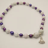 Collier perles violettes et jade avec pendentif